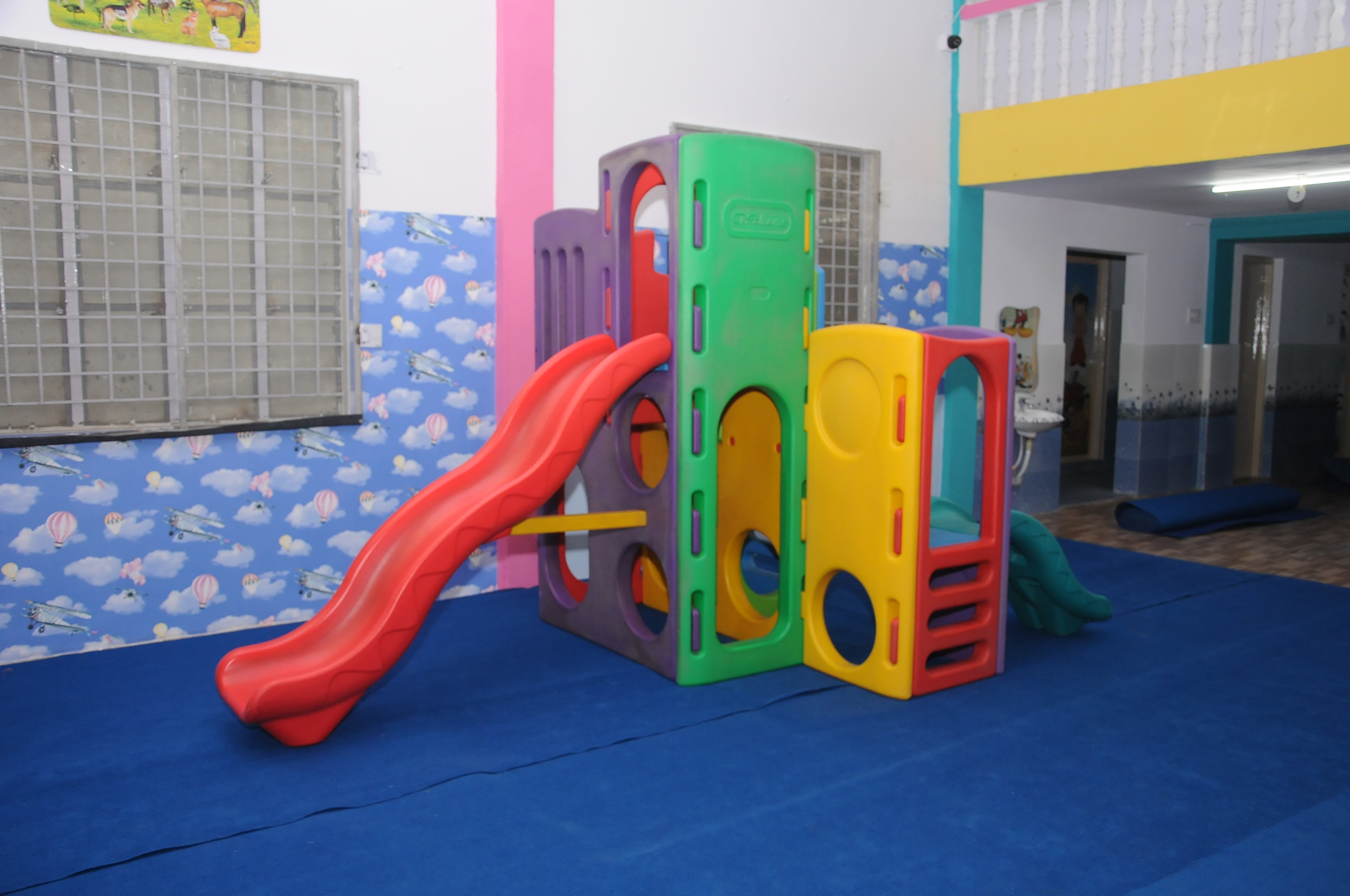 Colourful indoor play equipment at Kids Mansion